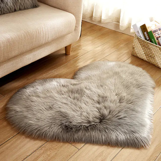 a heart shaped rug on the floor of a living room