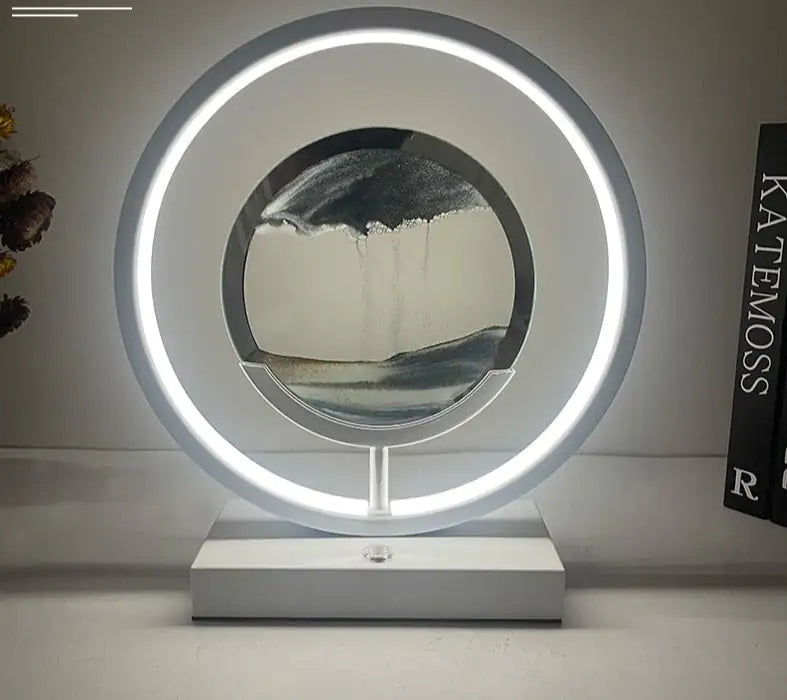 a circular light with a painting on it