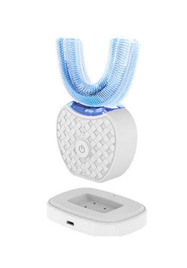 a toothbrush holder with a blue toothbrush on top of it
