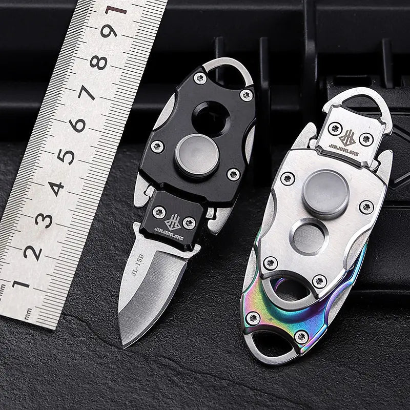 a pair of multicolored knifes next to a ruler