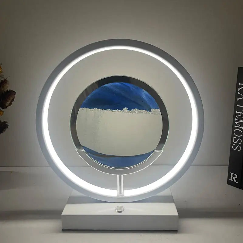 a round mirror sitting on top of a white table