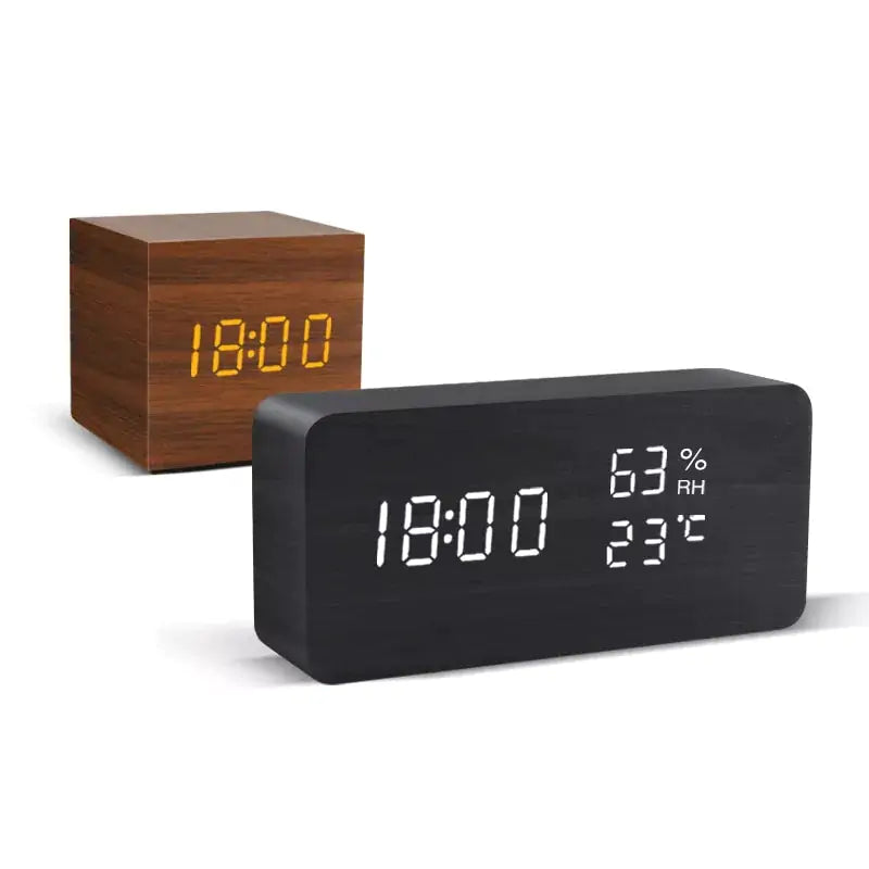 a wooden clock sitting next to a wooden block