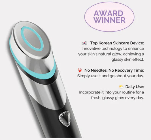 a black and silver electric toothbrush with a blue light on it