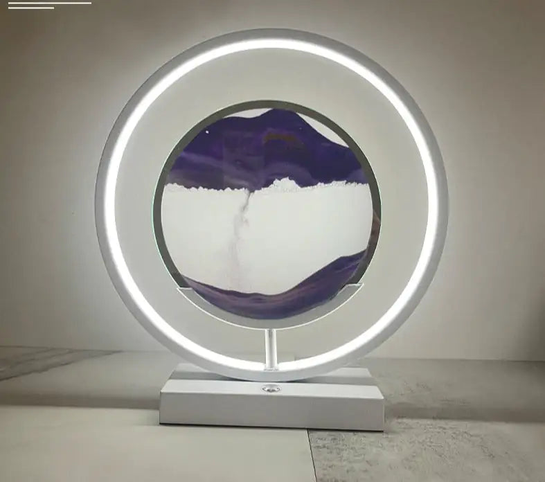 a circular glass sculpture with a purple and white design