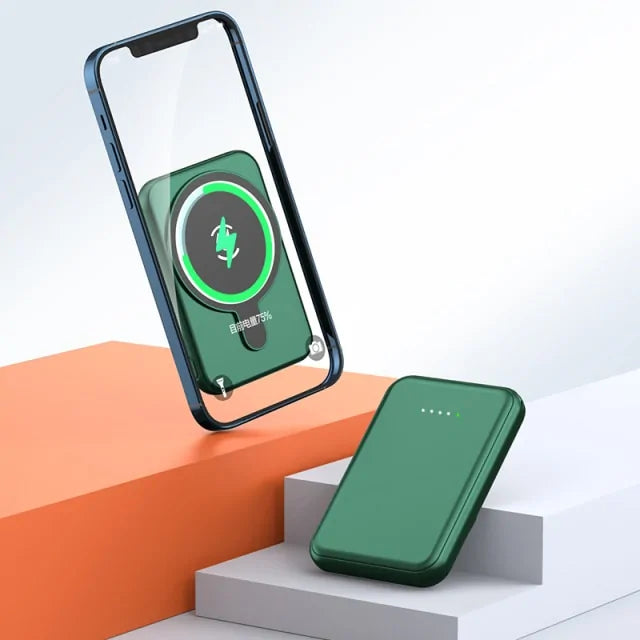 a green cell phone sitting on top of a set of steps