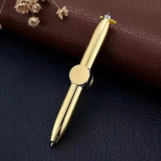 a pen sitting on top of a brown leather surface
