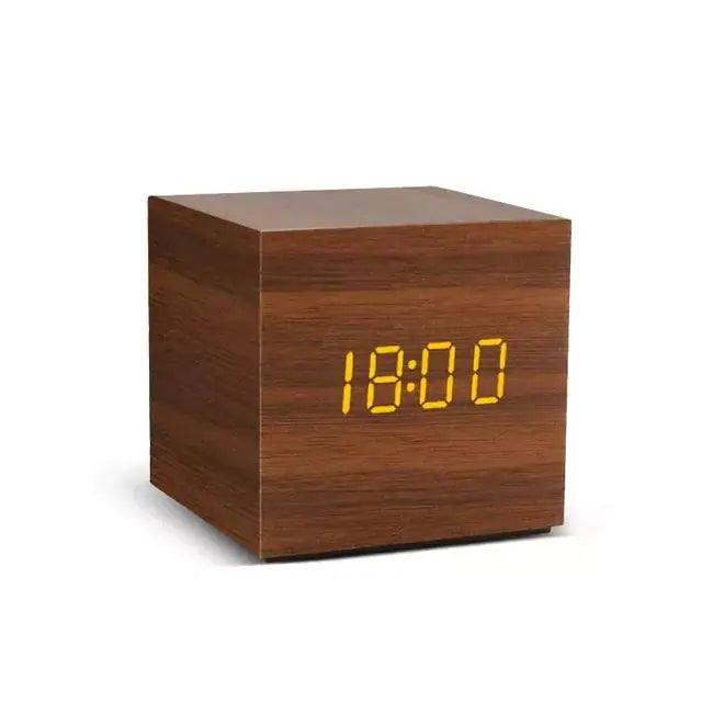 a wooden clock with a yellow digital display