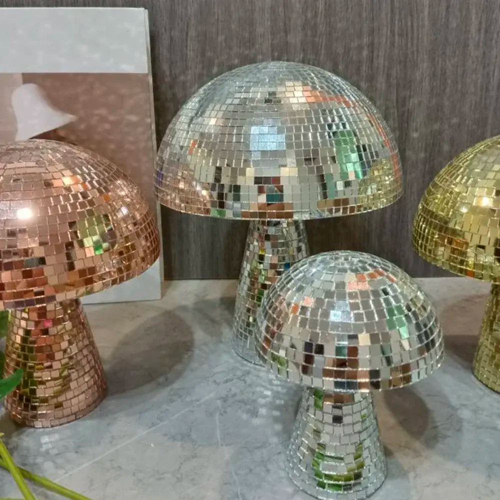 a group of disco ball lamps sitting on top of a table