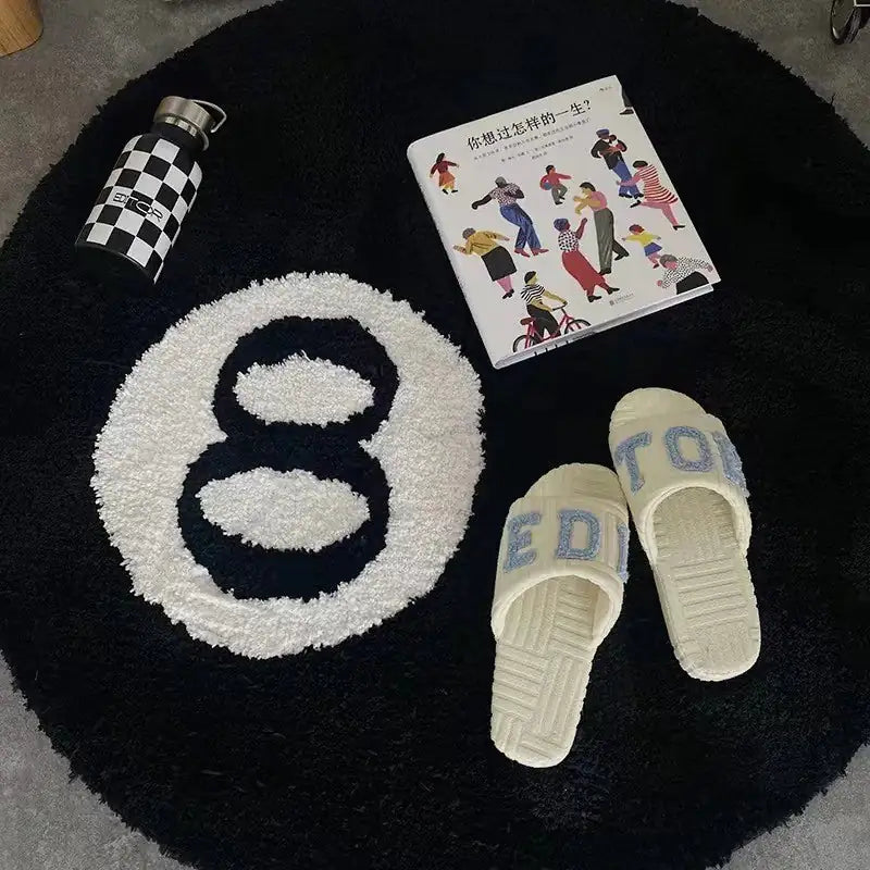 a pair of slippers sitting on top of a rug