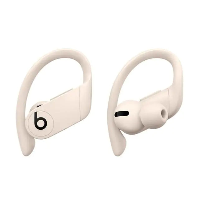 a pair of white earphones sitting next to each other