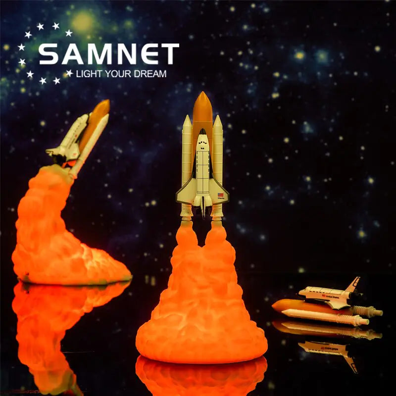 a model of a space shuttle on a black surface