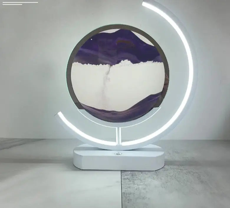 a circular object with a purple and white painting on it