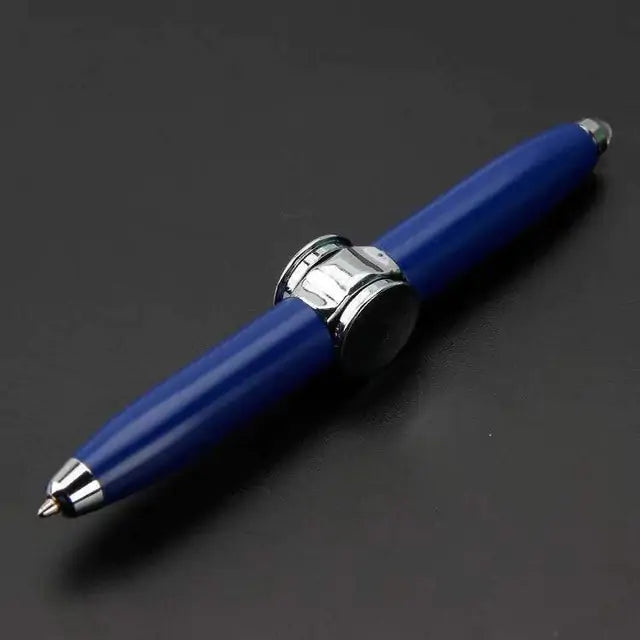 a blue pen sitting on top of a table
