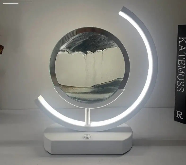 a white table with a circular light on it