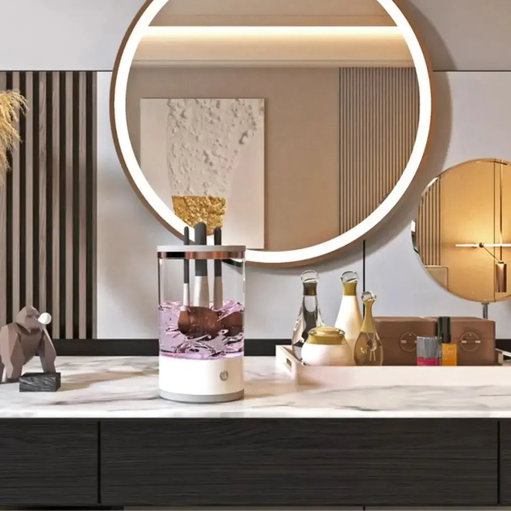 a bathroom vanity with a round mirror above it