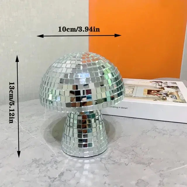 a table with a mirror ball on top of it