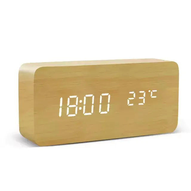 a wooden clock with white numbers on it