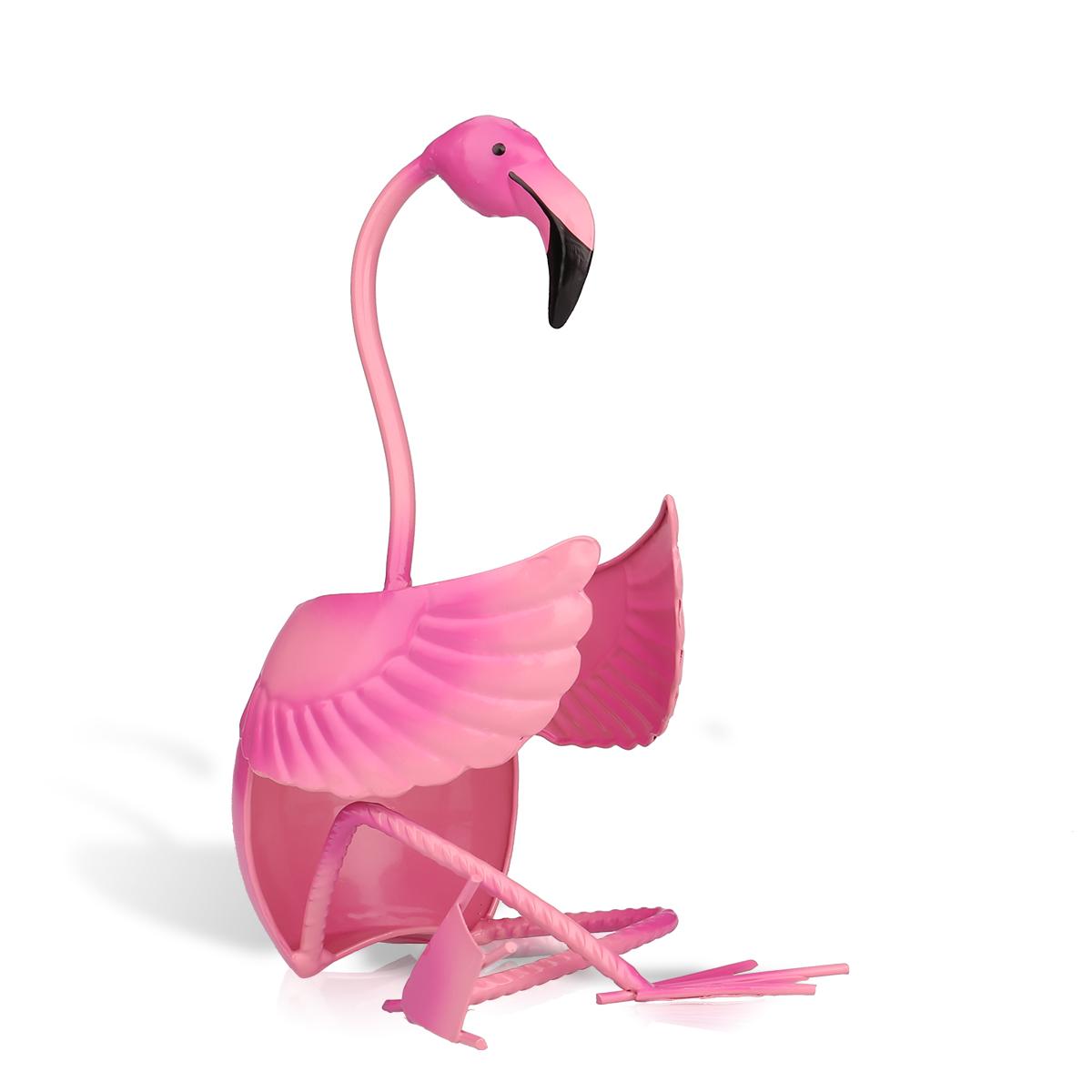 a pink plastic flamingo standing on its legs